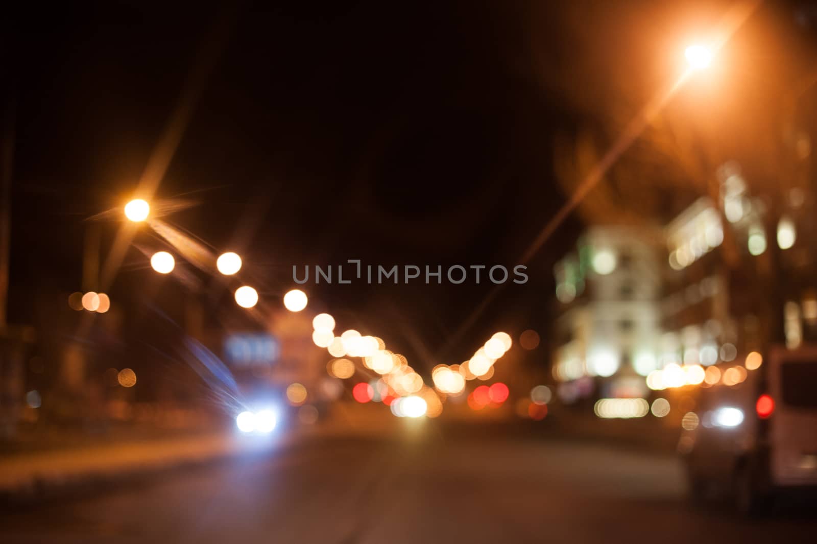 Night city street lighting lanterns and cars by timonko