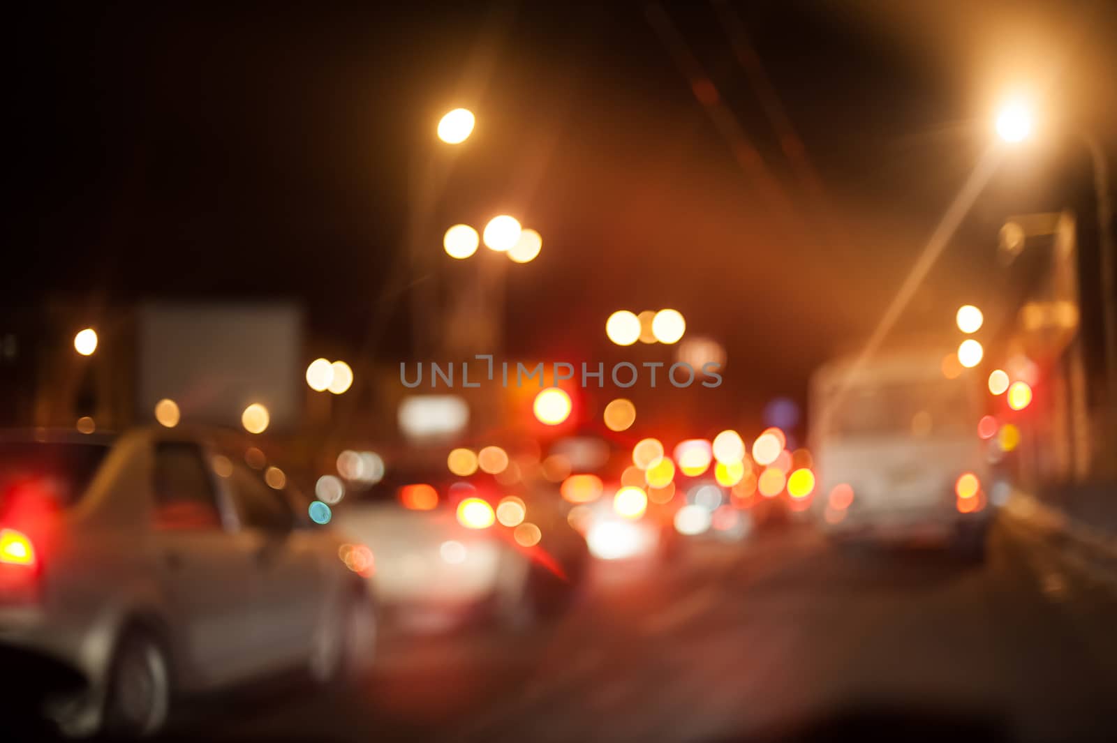 Night city street lighting lanterns and cars by timonko