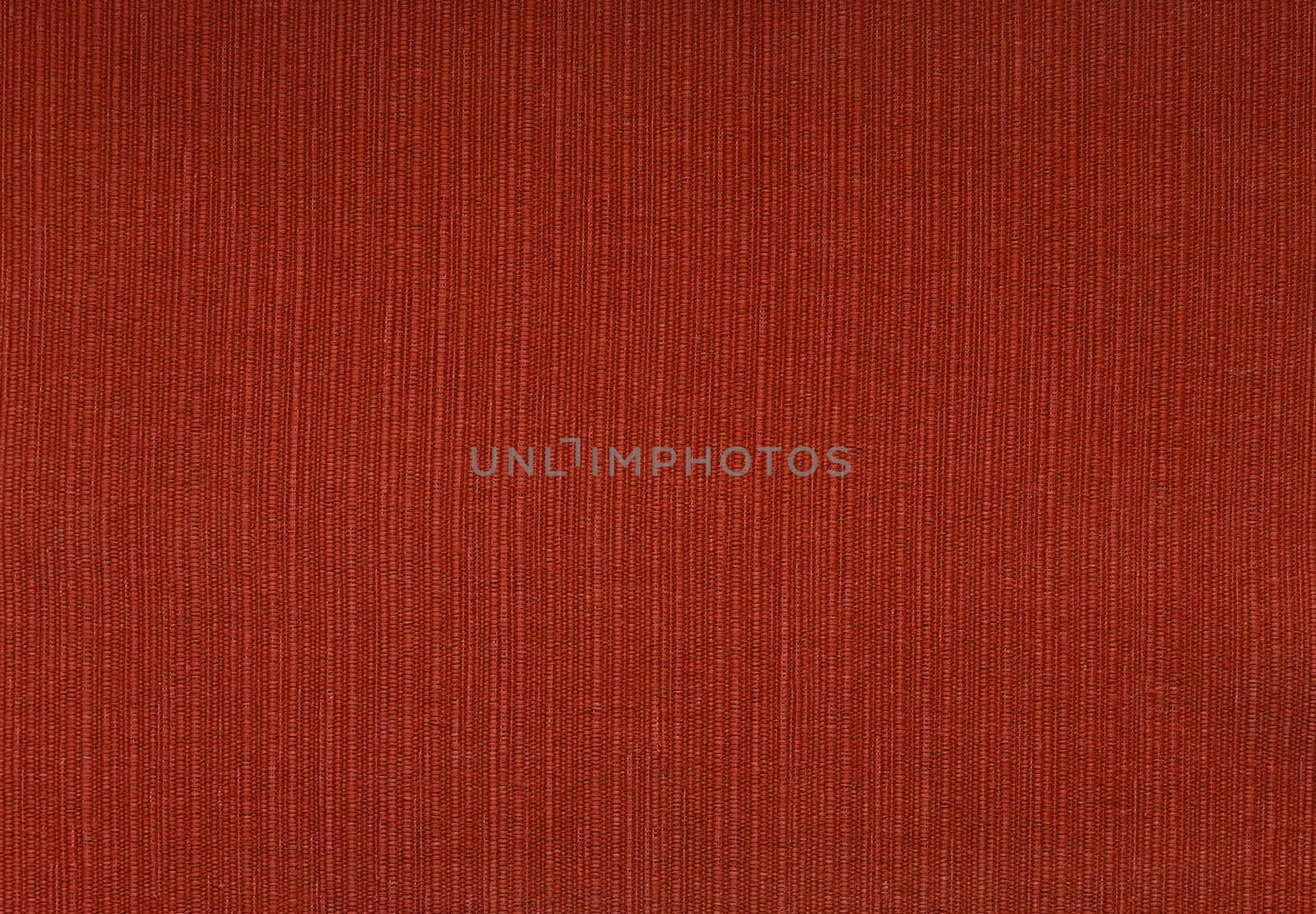 Deep red coarse woven fabric abstract background texture showing warp and weft