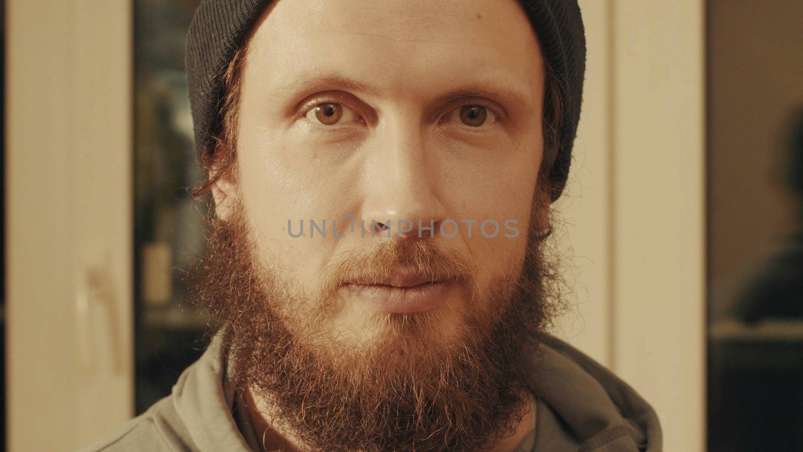 Portrait of caucasian man. He just looking in camera. Close up