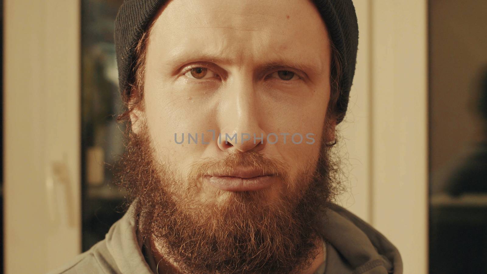 Portrait of caucasian man. He just looking in camera. Close up