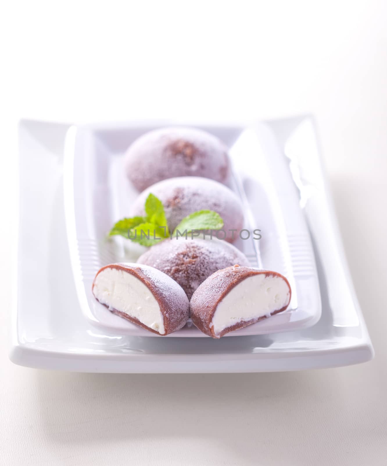The colorful mochi dessert ice cream on wood plate by supercat67
