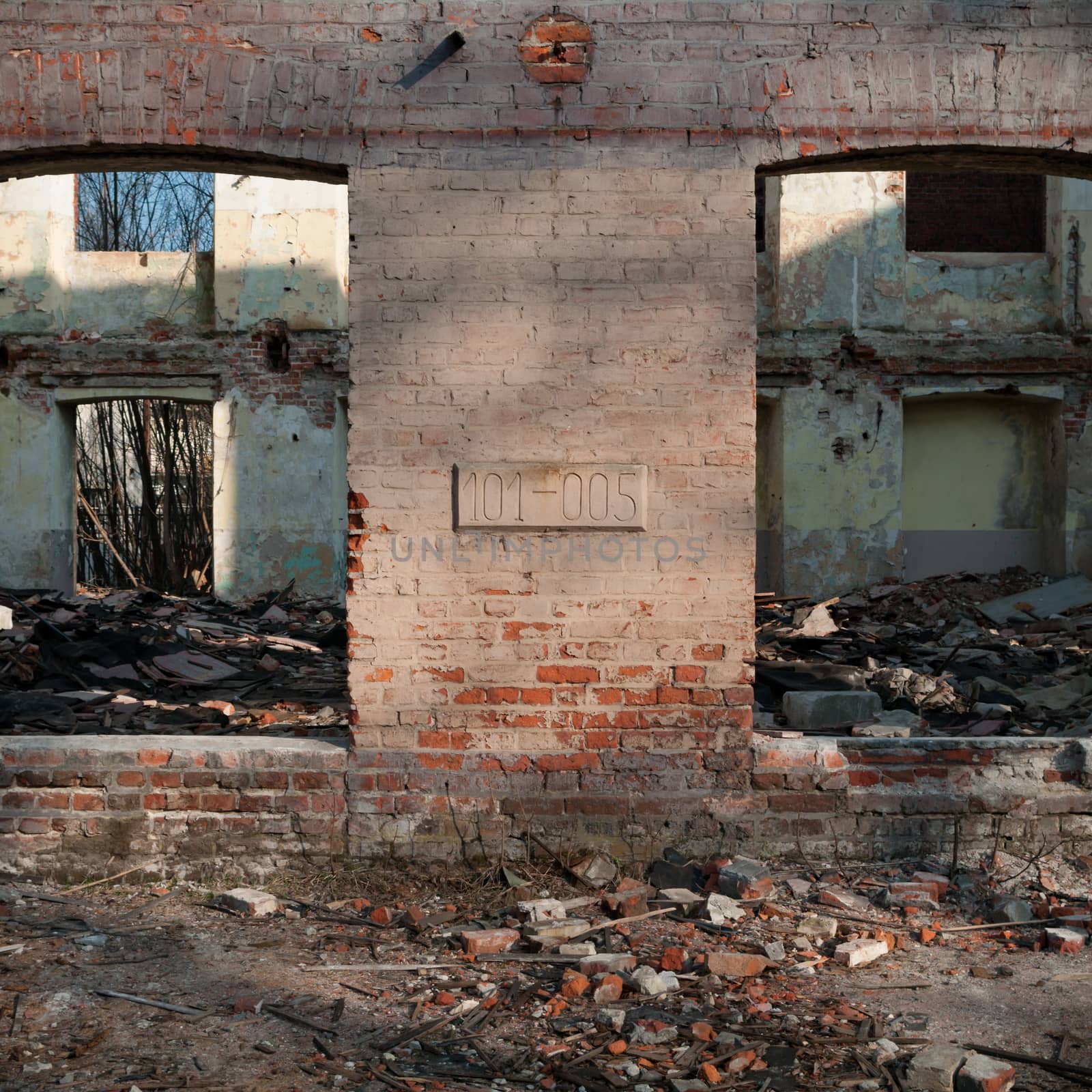 discarded ruin with old windows and wall, industrial window in concrete wall