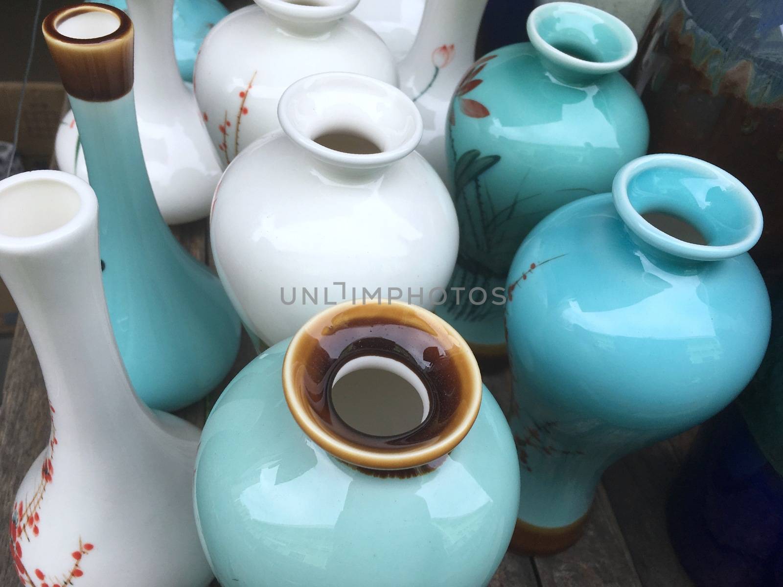 Closeup of antique traditional Asian style vases. Ceramic vases pottery for home.