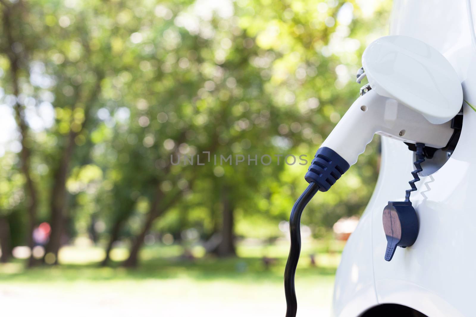 Charging battery of an electric car by wellphoto