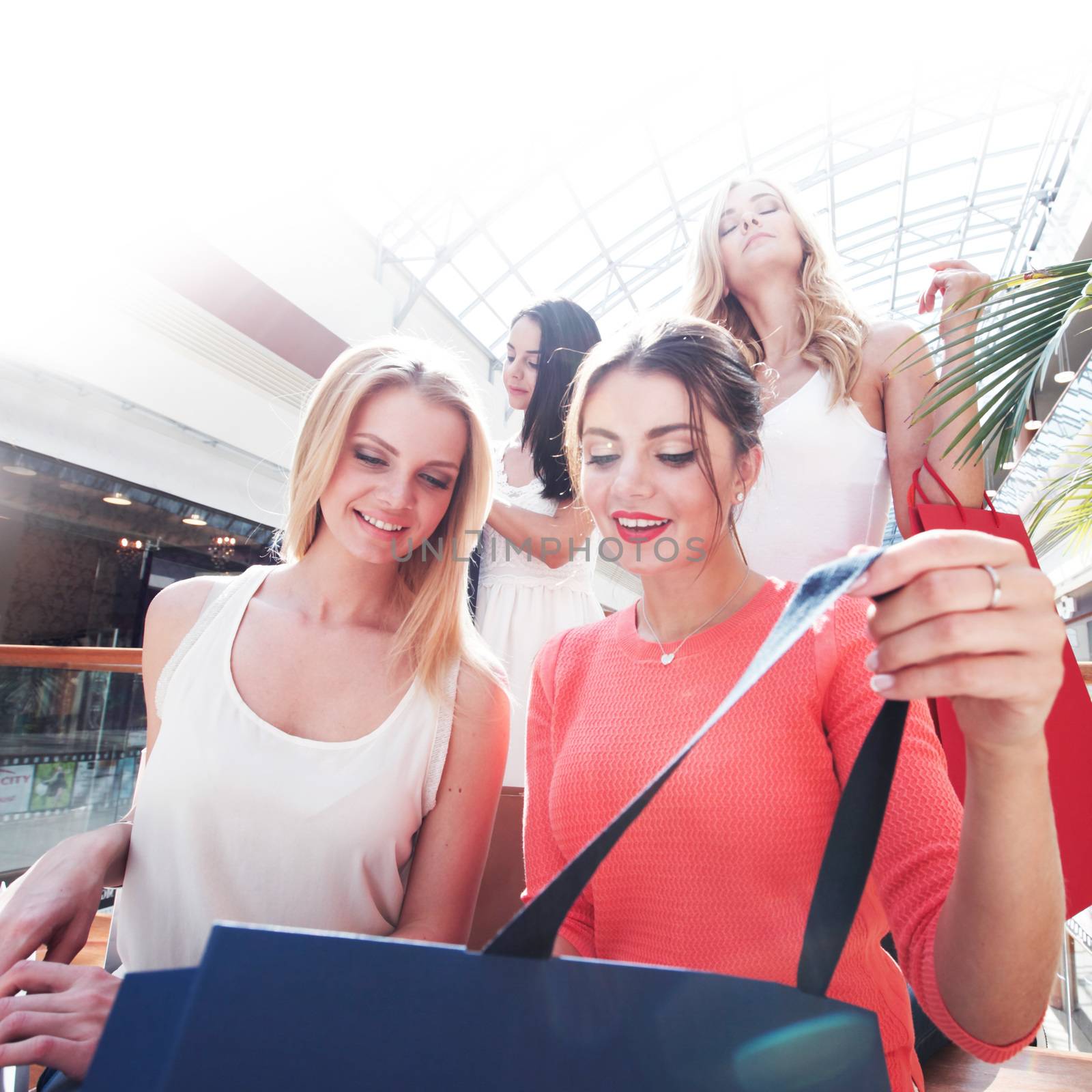 beautiful young women shopping at mall