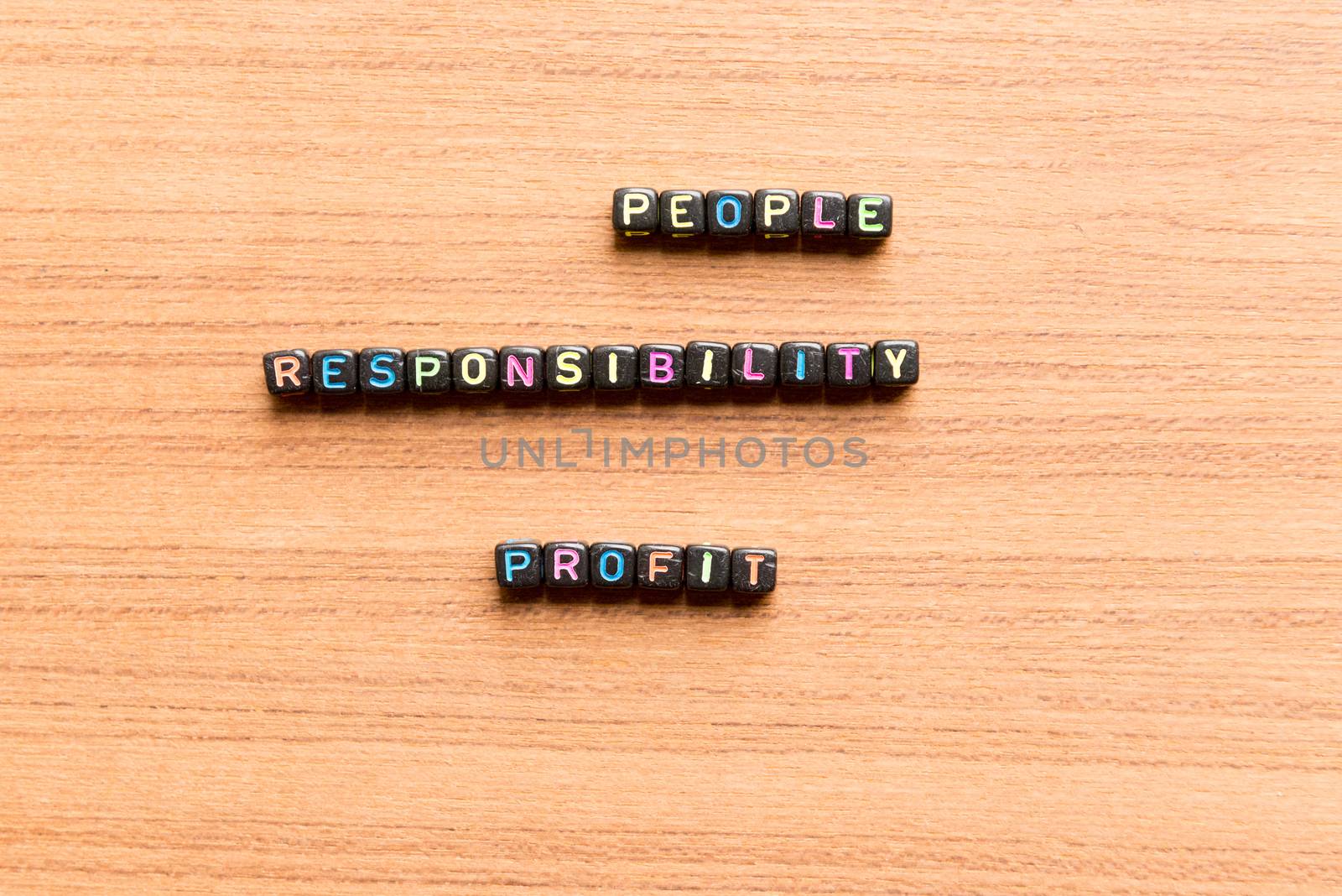 people responsibility profit words in wooden background