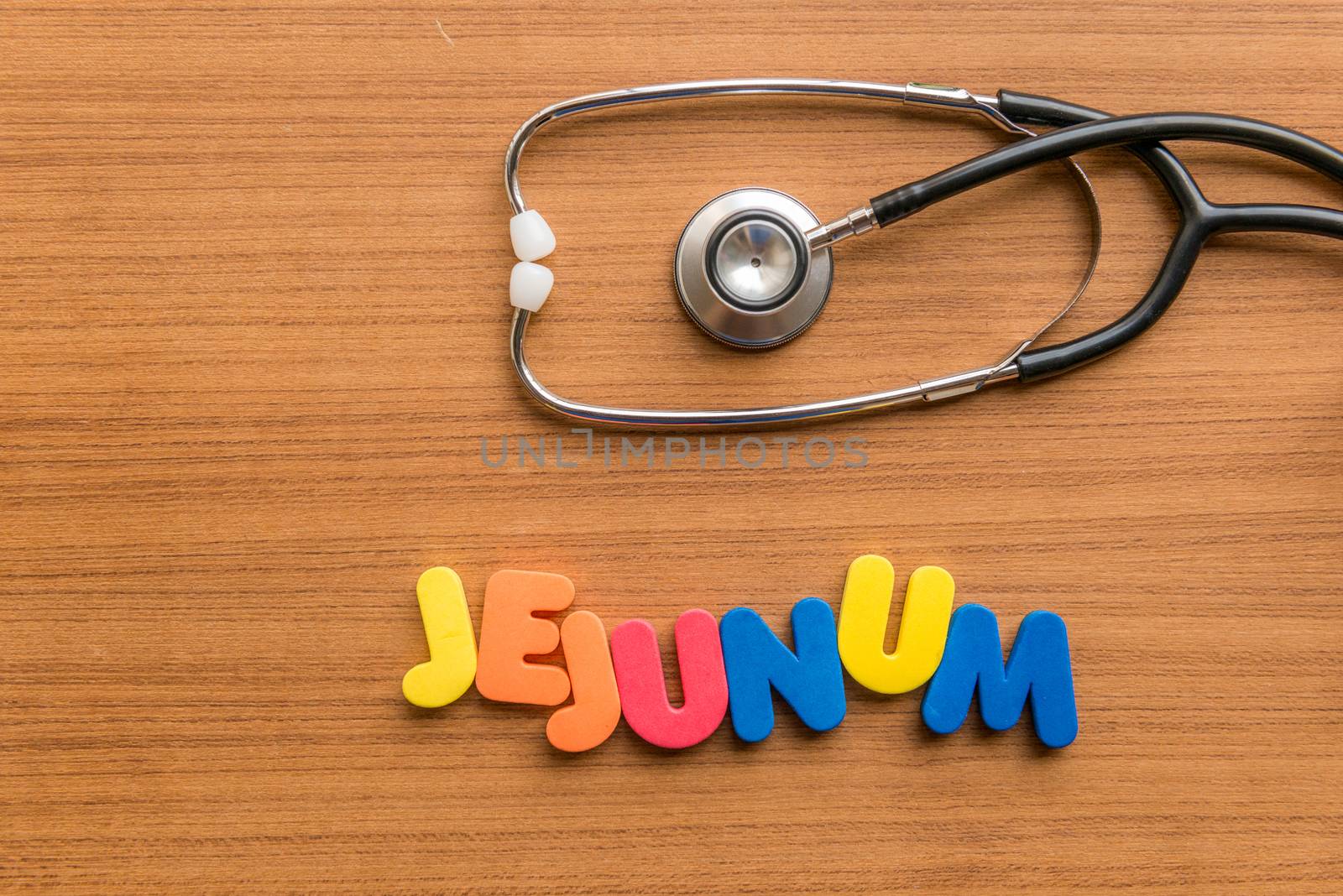 jejunum colorful word with Stethoscope on wooden background