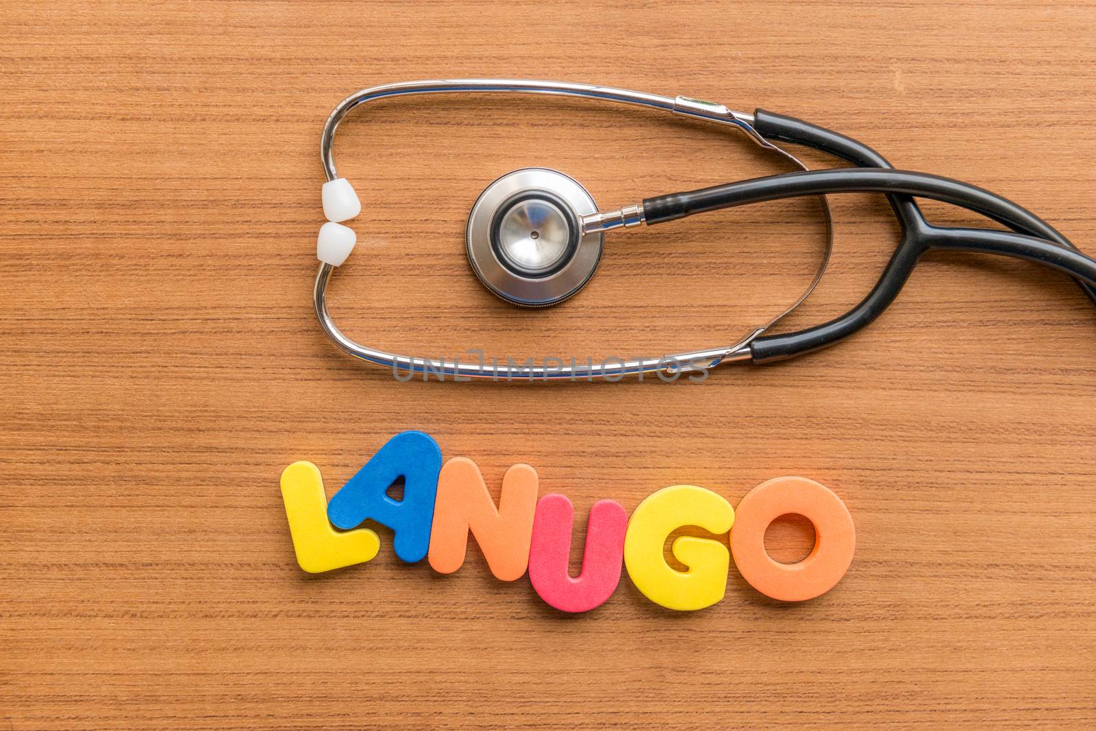 lanugo colorful word with Stethoscope on wooden background