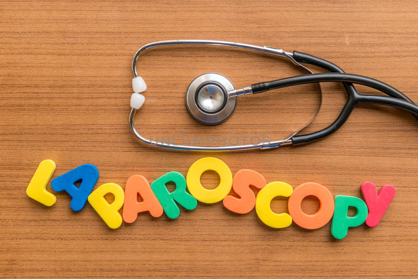 laparoscopy colorful word with Stethoscope on wooden background