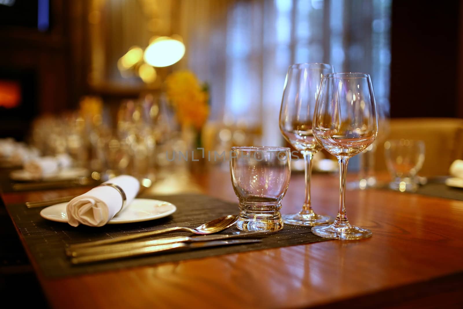 Plates and Glasses on the table in the restaurant