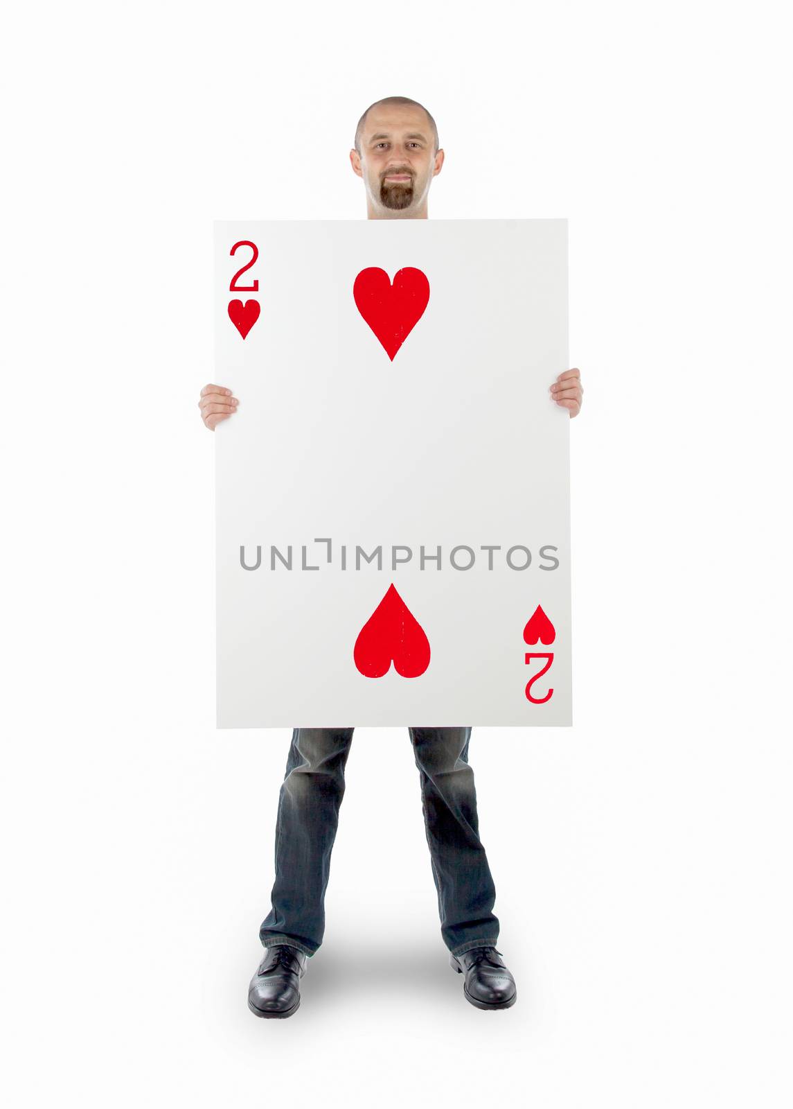 Businessman with large playing card - Two of hearts
