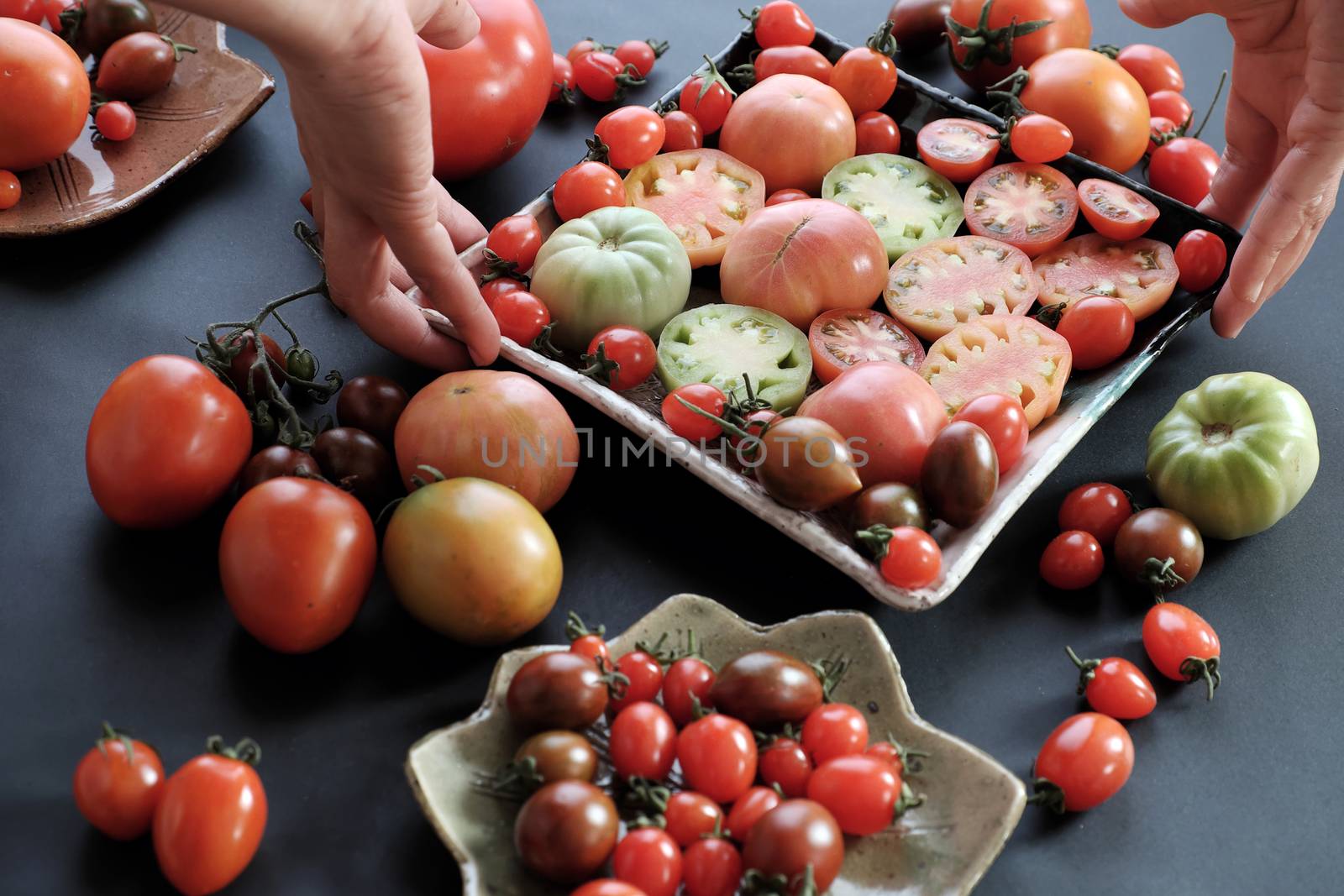 Collect of tomatoes, a popular and cheap food with many uses as antioxidants, skin care, anticancer, good for alzheimer people, this vegetable rich vitamin a, vitamin c, fiber, carotenoids, lycopene