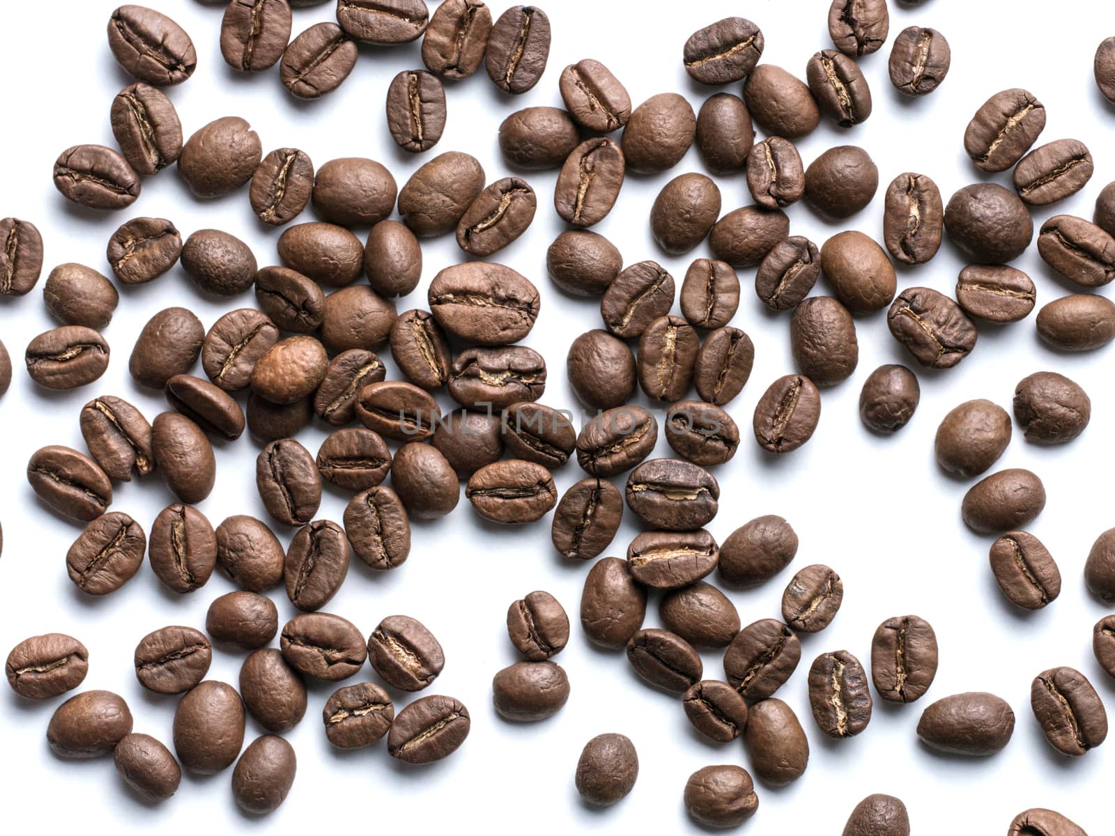 Coffee beans closeup on white background by fascinadora