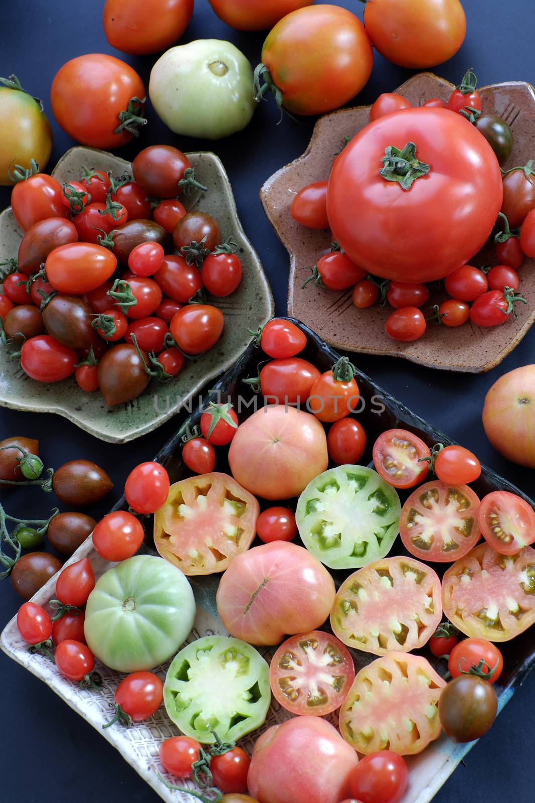 Collect of tomatoes, a popular and cheap food with many uses as antioxidants, skin care, anticancer, good for alzheimer people, this vegetable rich vitamin a, vitamin c, fiber, carotenoids, lycopene