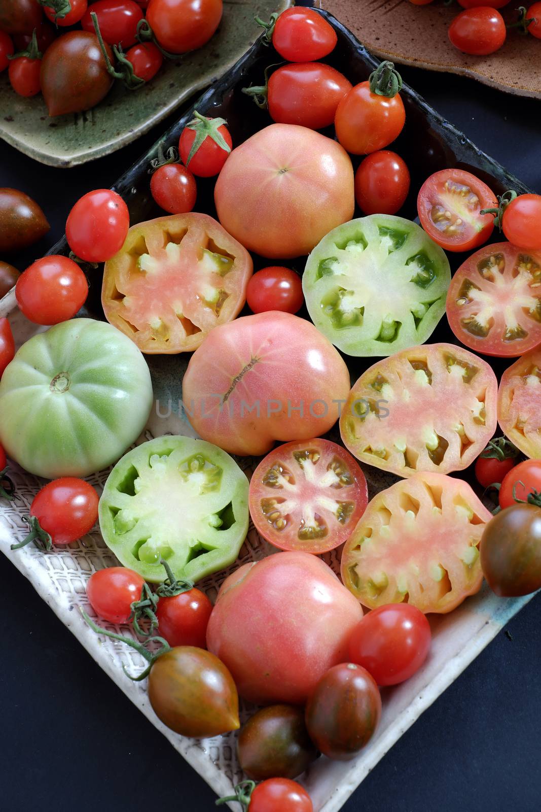 Collect of tomatoes, a popular and cheap food with many uses as antioxidants, skin care, anticancer, good for alzheimer people, this vegetable rich vitamin a, vitamin c, fiber, carotenoids, lycopene