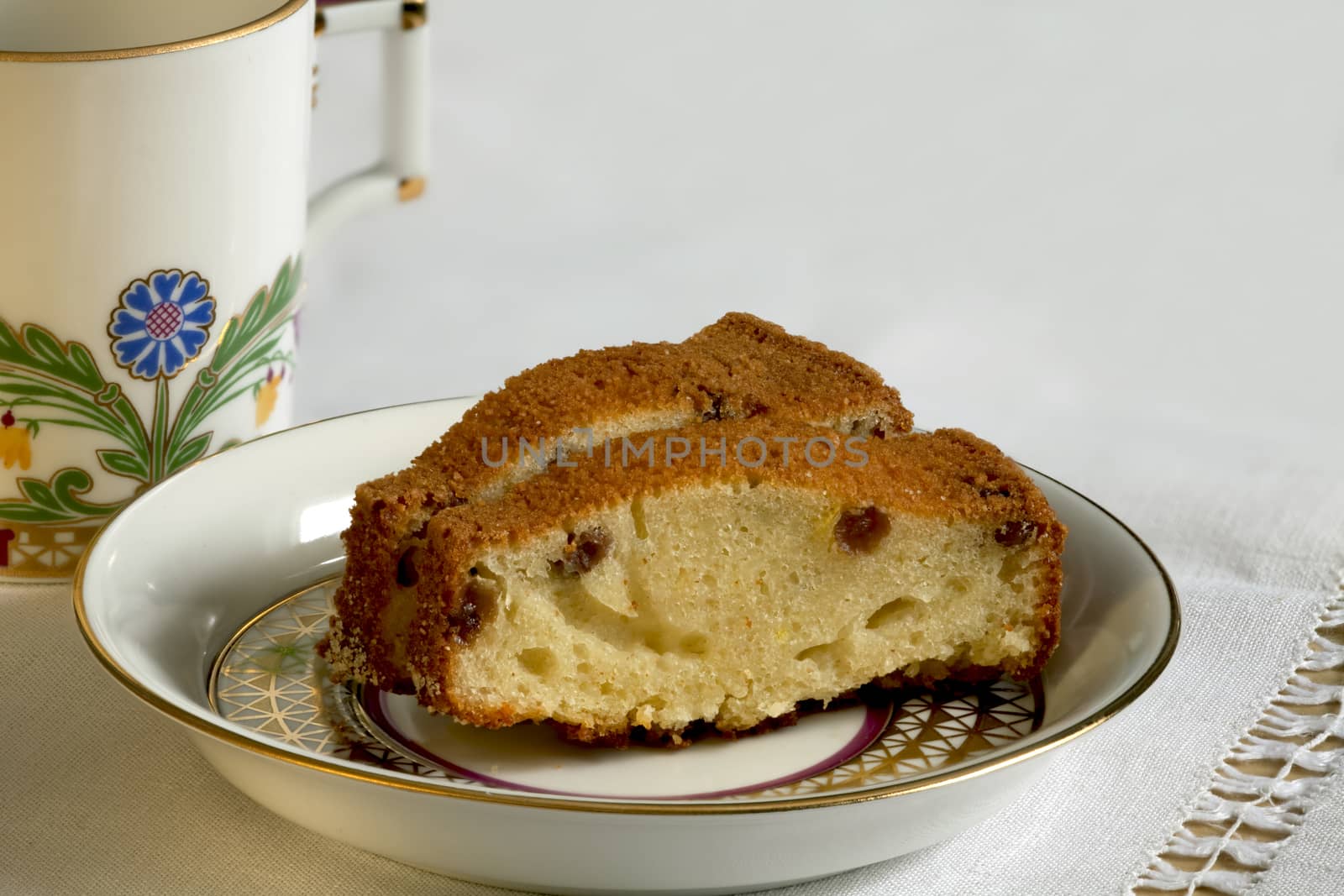 tasty cake with raisins with a ruddy crust to the tea macro shot