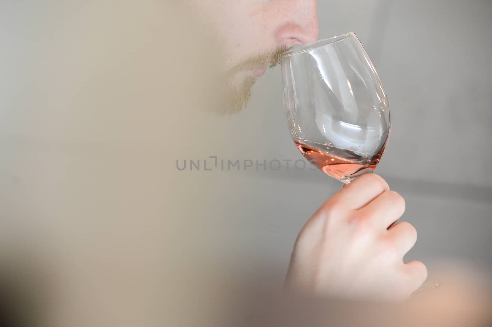 Tasting-White wine pour in a glass, bordeaux wineyard