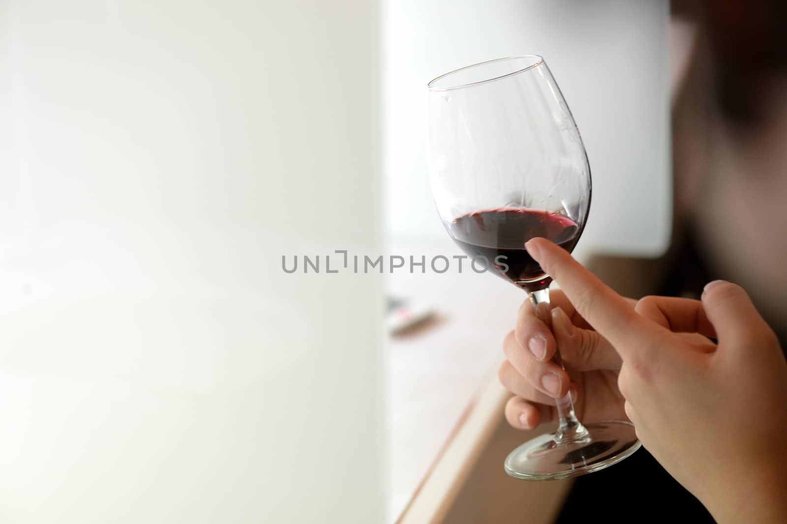 Tasting-White wine pour in a glass, bordeaux wineyard