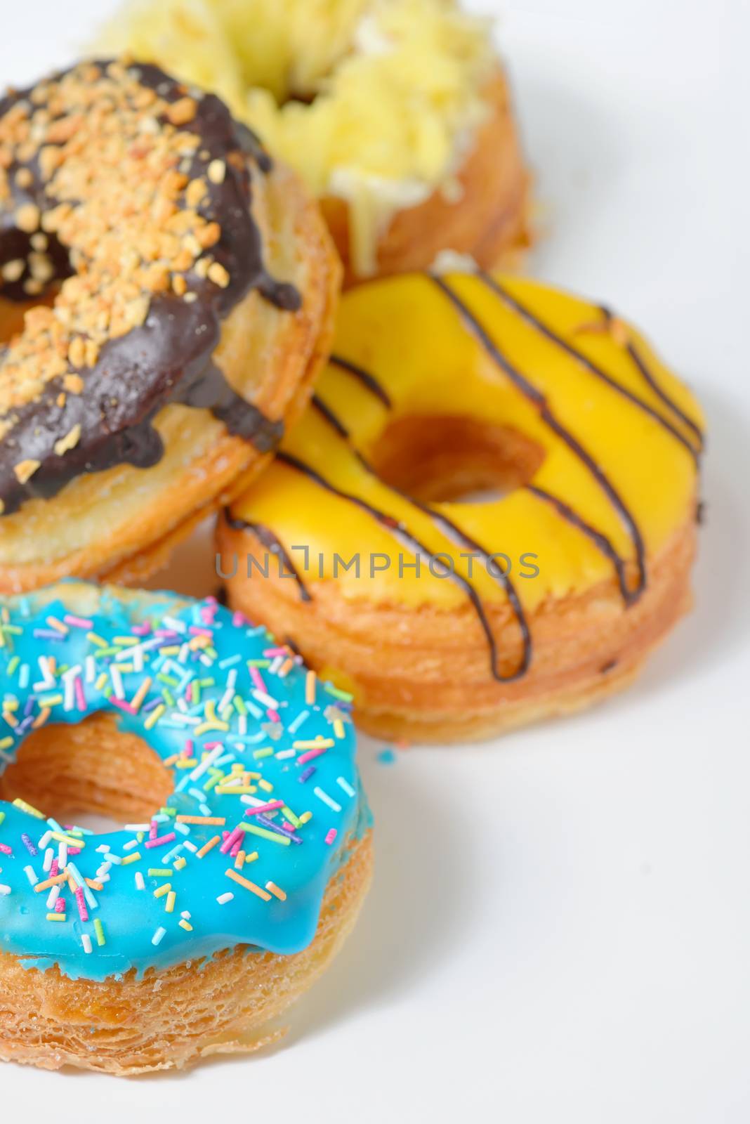Different Types of Donuts on white table