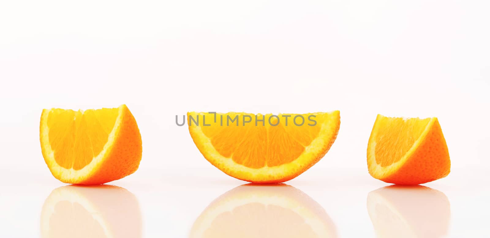 Orange wedges by Digifoodstock