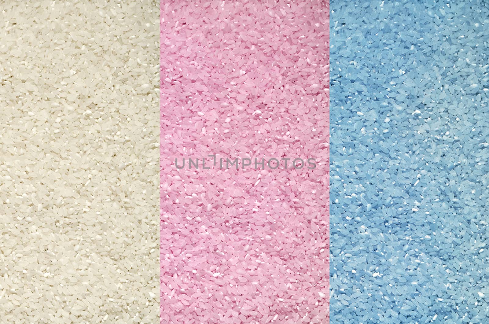 Textured background of colorful rice grains on the surface by Gaina