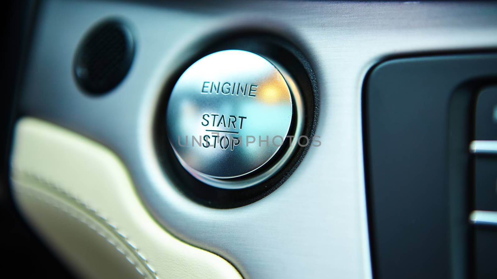 Start stop engine modern new car button.