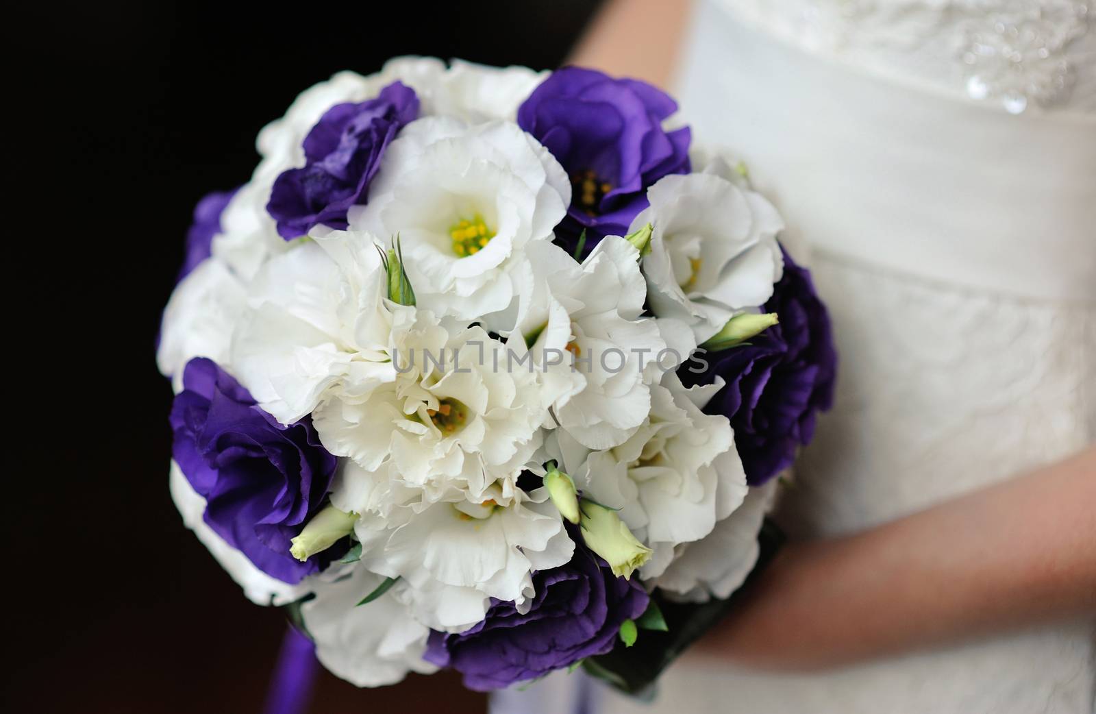 Bride holding beautiful wedding bouquet by timonko