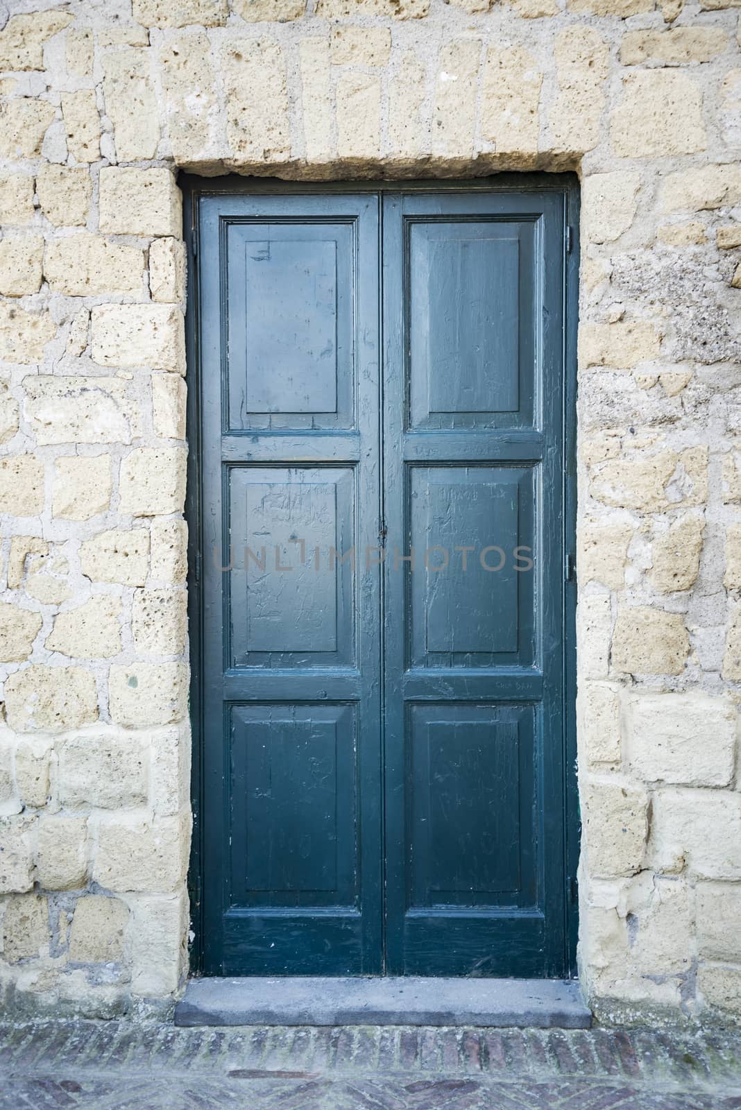 Wooden Ancient Italian Door in Historic Center