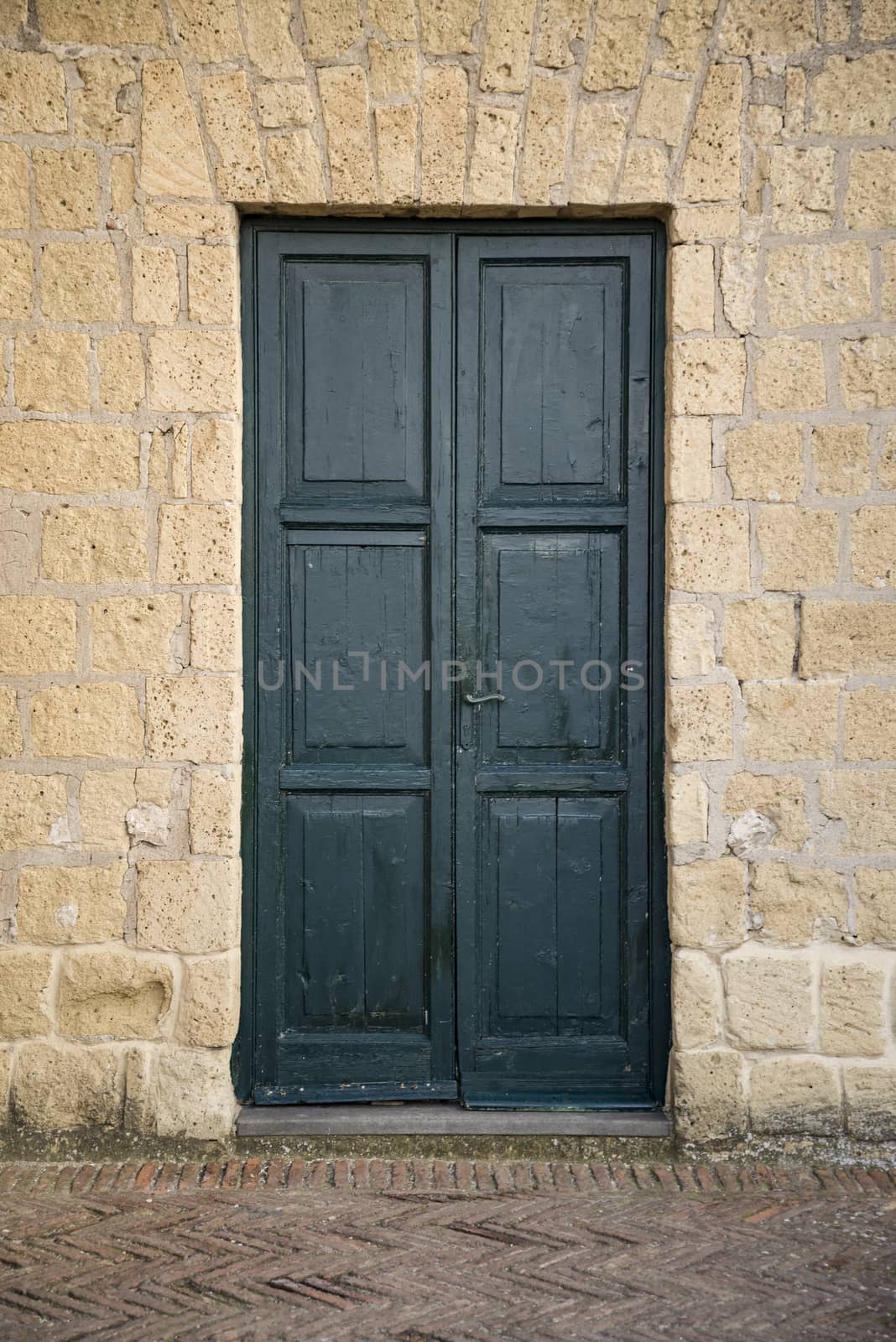 Wooden Ancient Italian Door in Historic Center