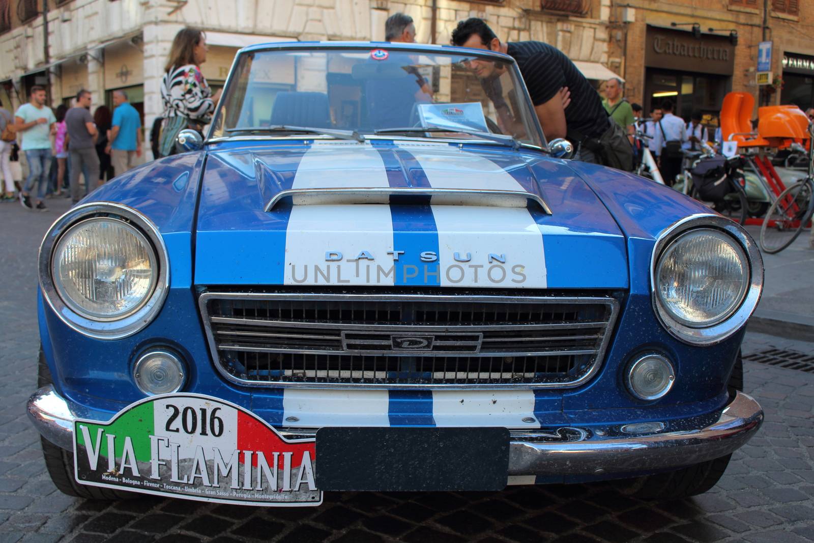 Ferrara, Italia - September 24, 2016: The event "AutoMotoStoriche in Old Town" you can admire an exhibition of cars and motorcycles in the historic center of Ferrara. Front of Datsun Sports,