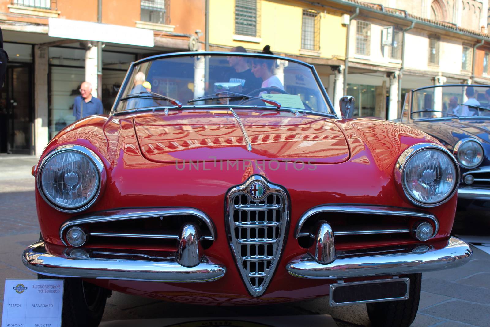 Ferrara, Italia - September 24, 2016: The event "AutoMotoStoriche in Old Town" you can admire an exhibition of cars and motorcycles in the historic center of Ferrara. Front of Alfa Romeo Giulietta