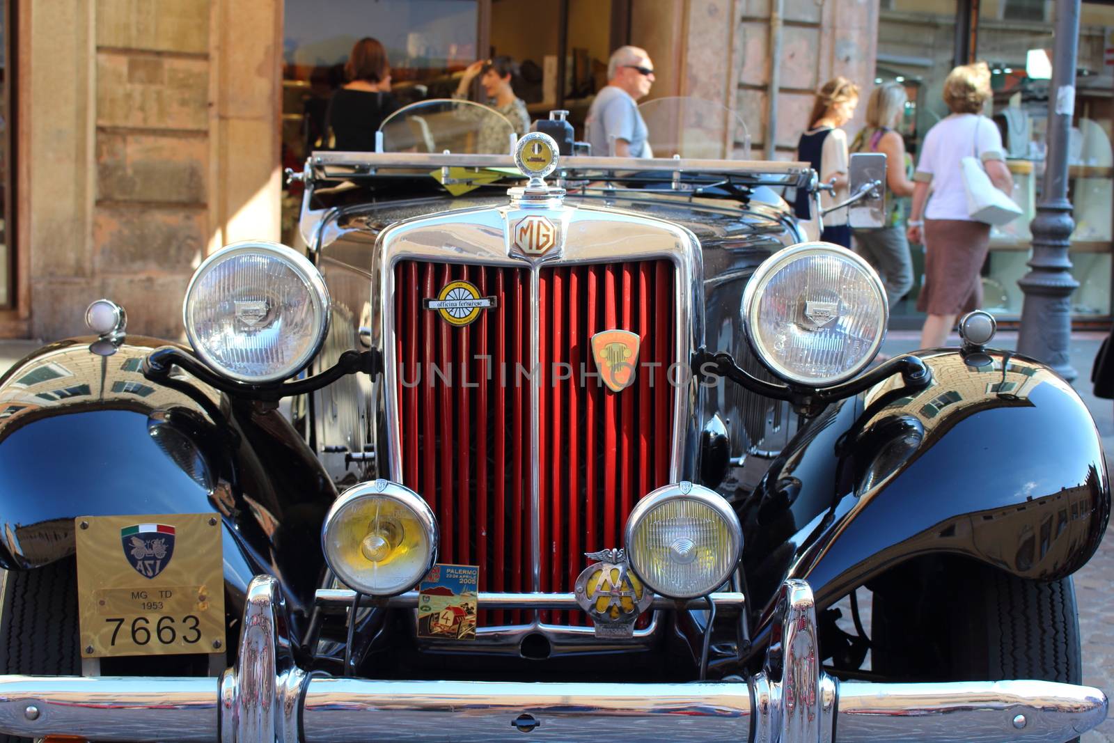 Ferrara, Italia - September 24, 2016: The event "AutoMotoStoriche in Old Town" you can admire an exhibition of cars and motorcycles in the historic center of Ferrara. Front of MG TD, years 1953