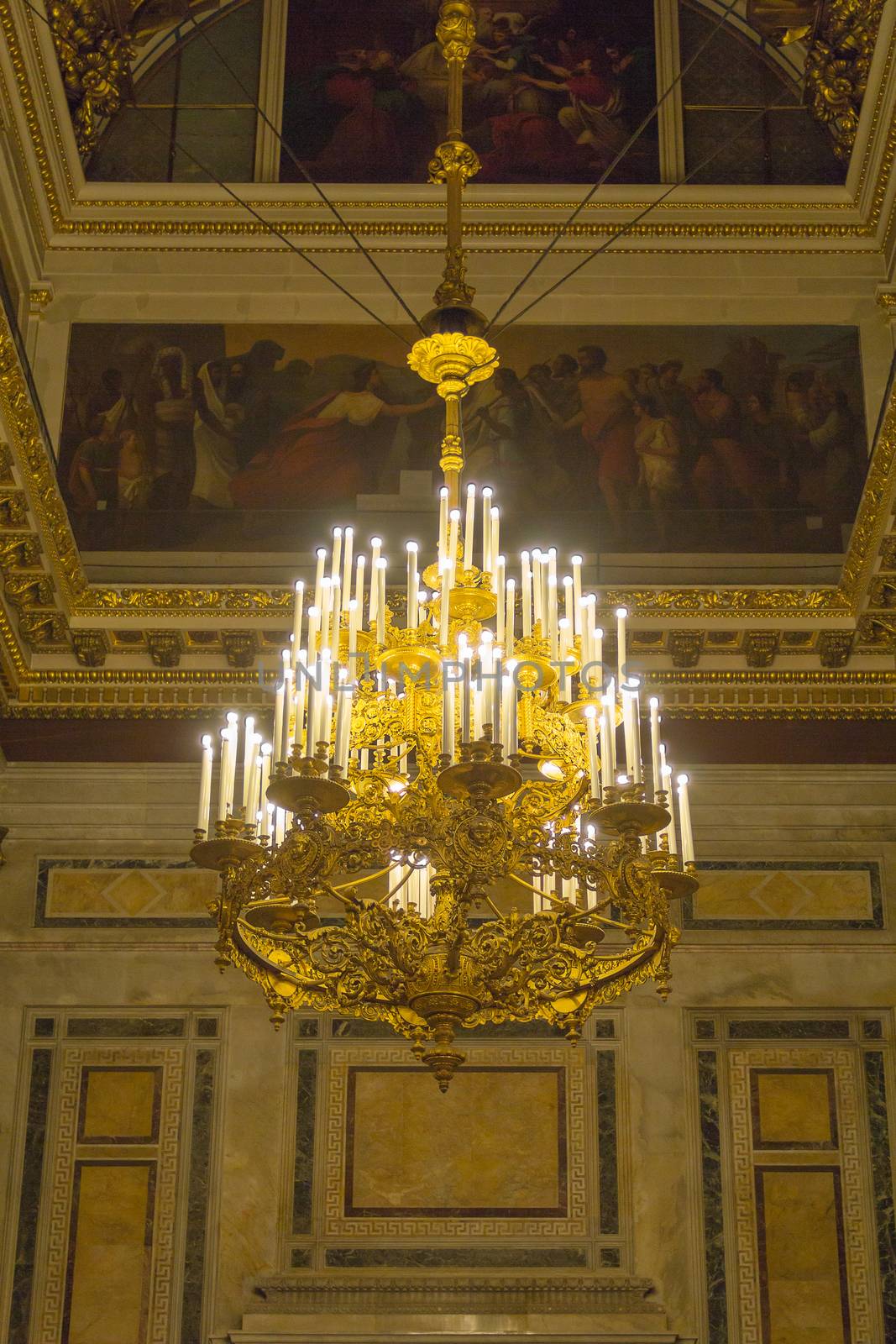 Old vintage chandelier hanging from the ceiling