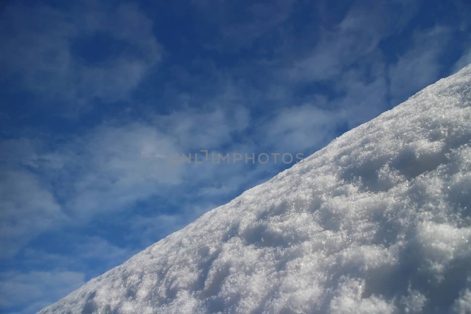 mountain slope white snow blue sky by mrivserg
