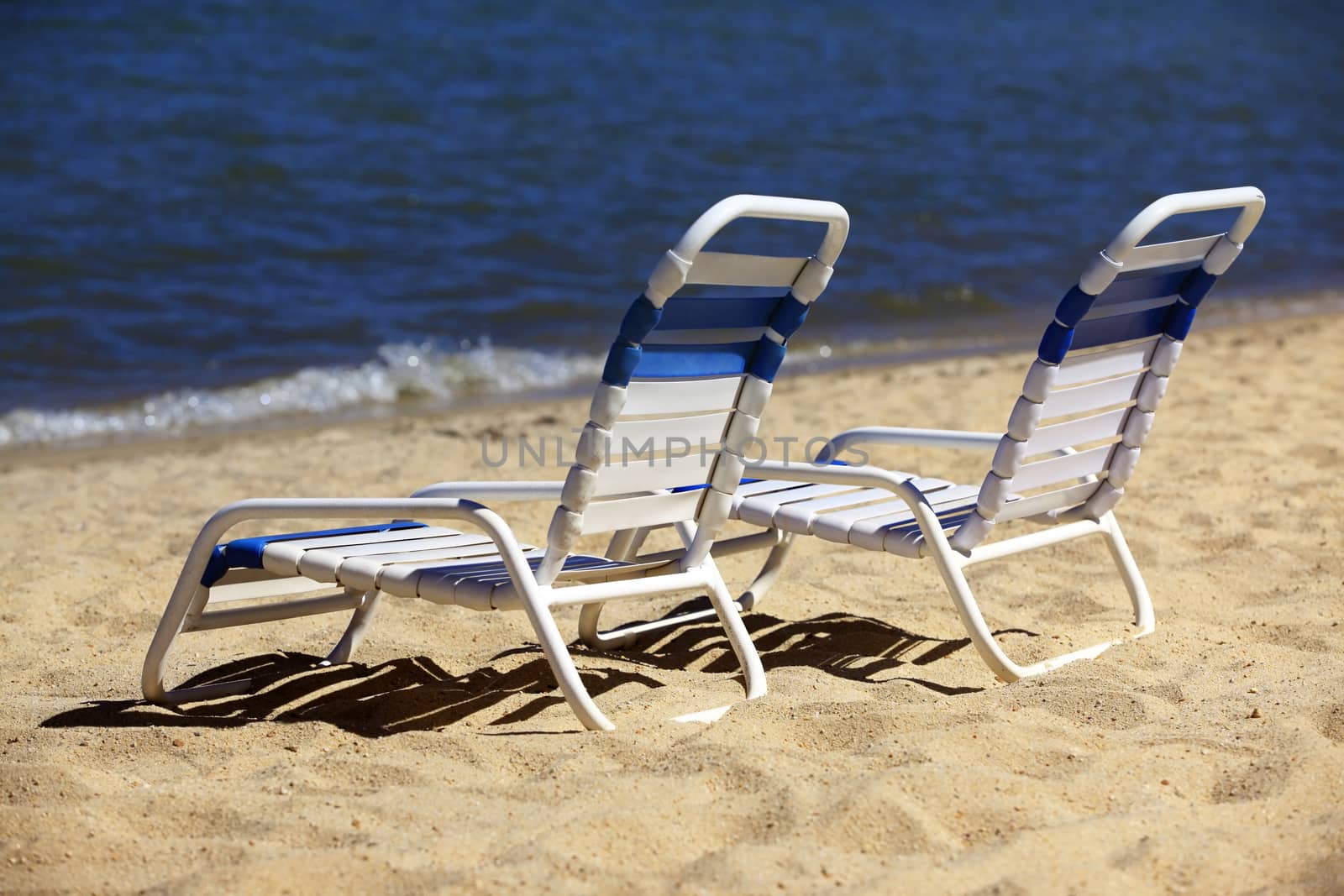 Reclining chairs on the shore of Lake Tahoe