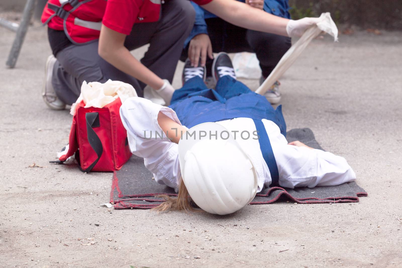 First aid after workplace accident by wellphoto