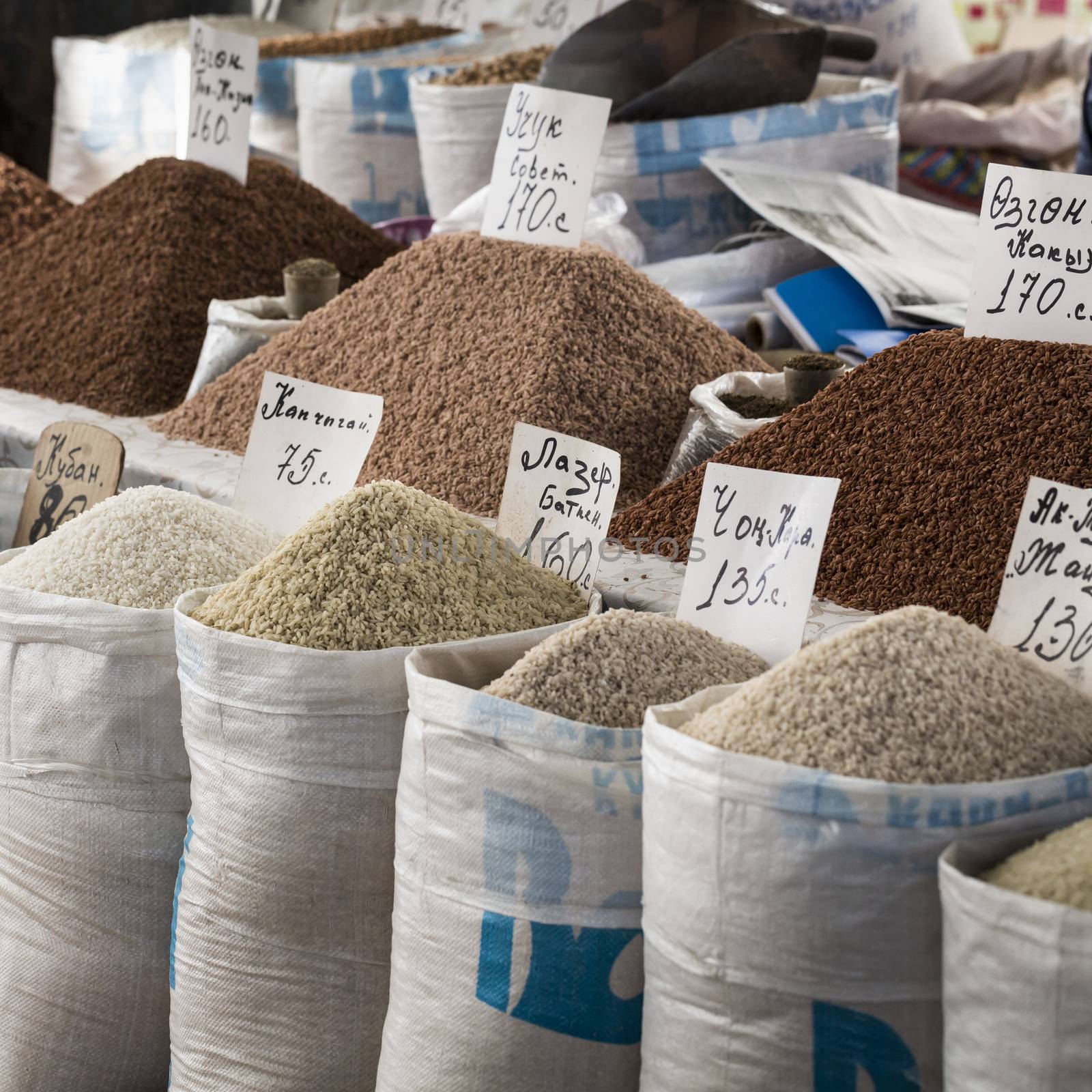 Osh bazaar in Kyrgyzstan - nuts and raisins for sale.