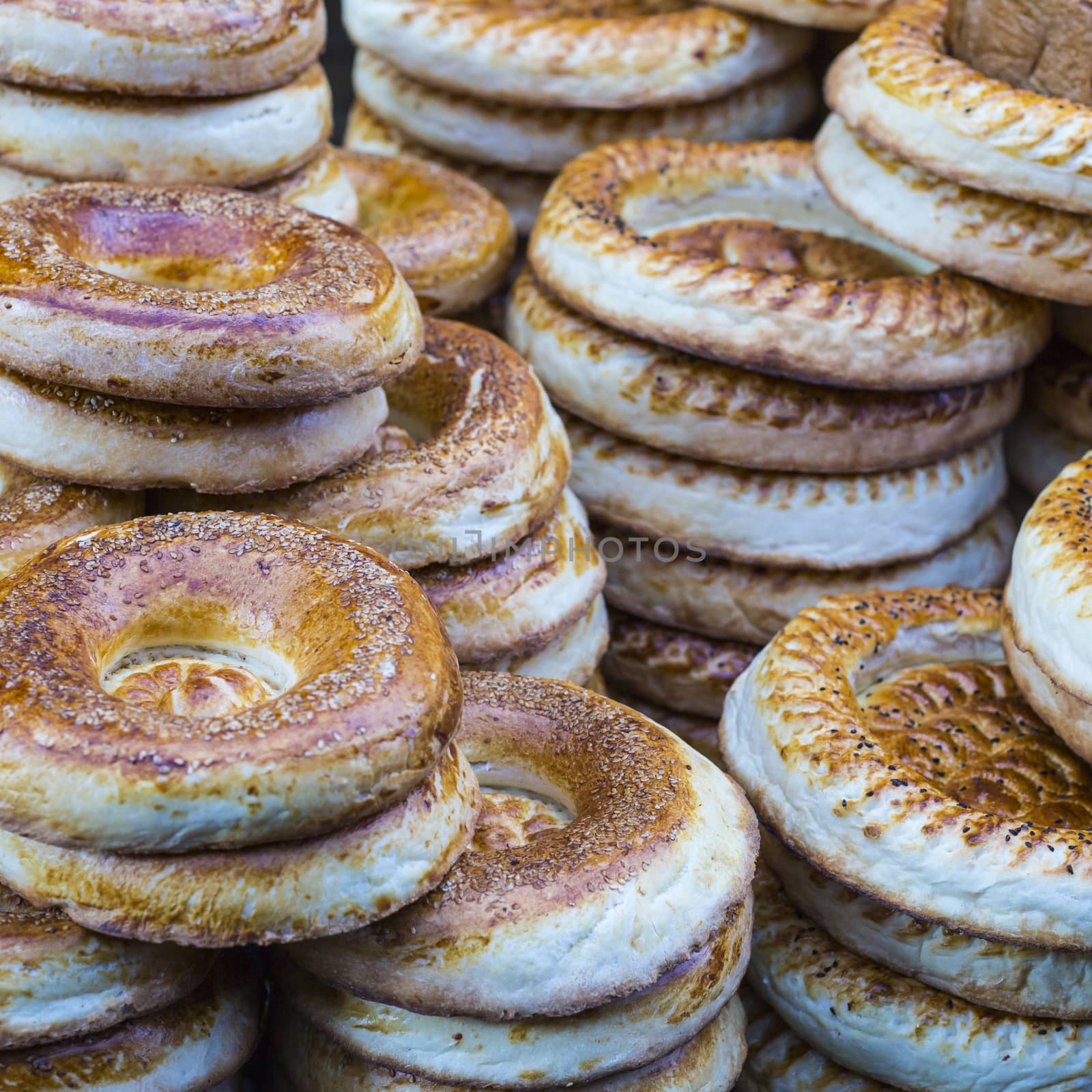 Kirghiz bread tokoch on Sunday market in Osh. Kyrgyzstan.