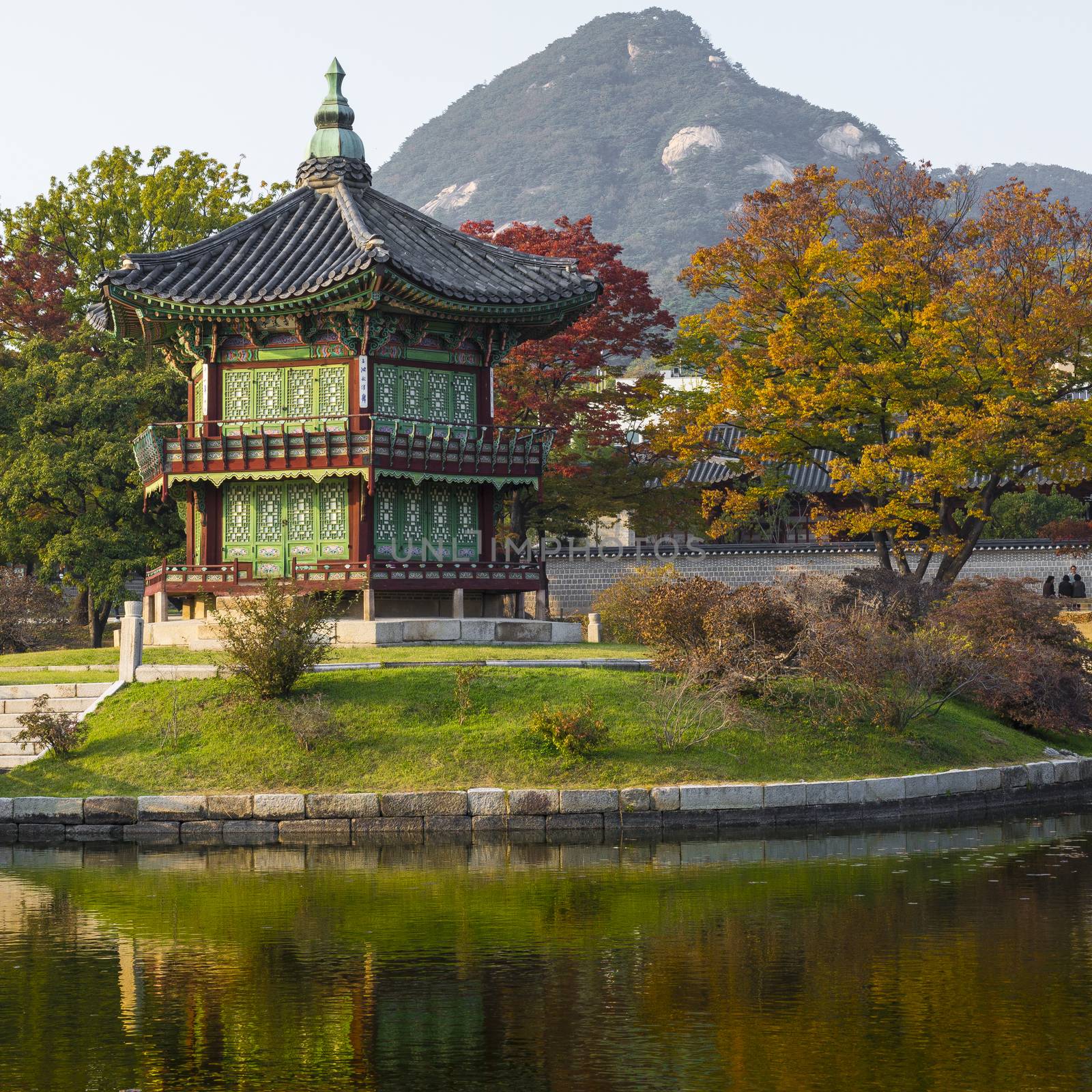 Emperor palace at Seoul. South Korea. Lake. Mountain. Reflections on lake. Autumn time.