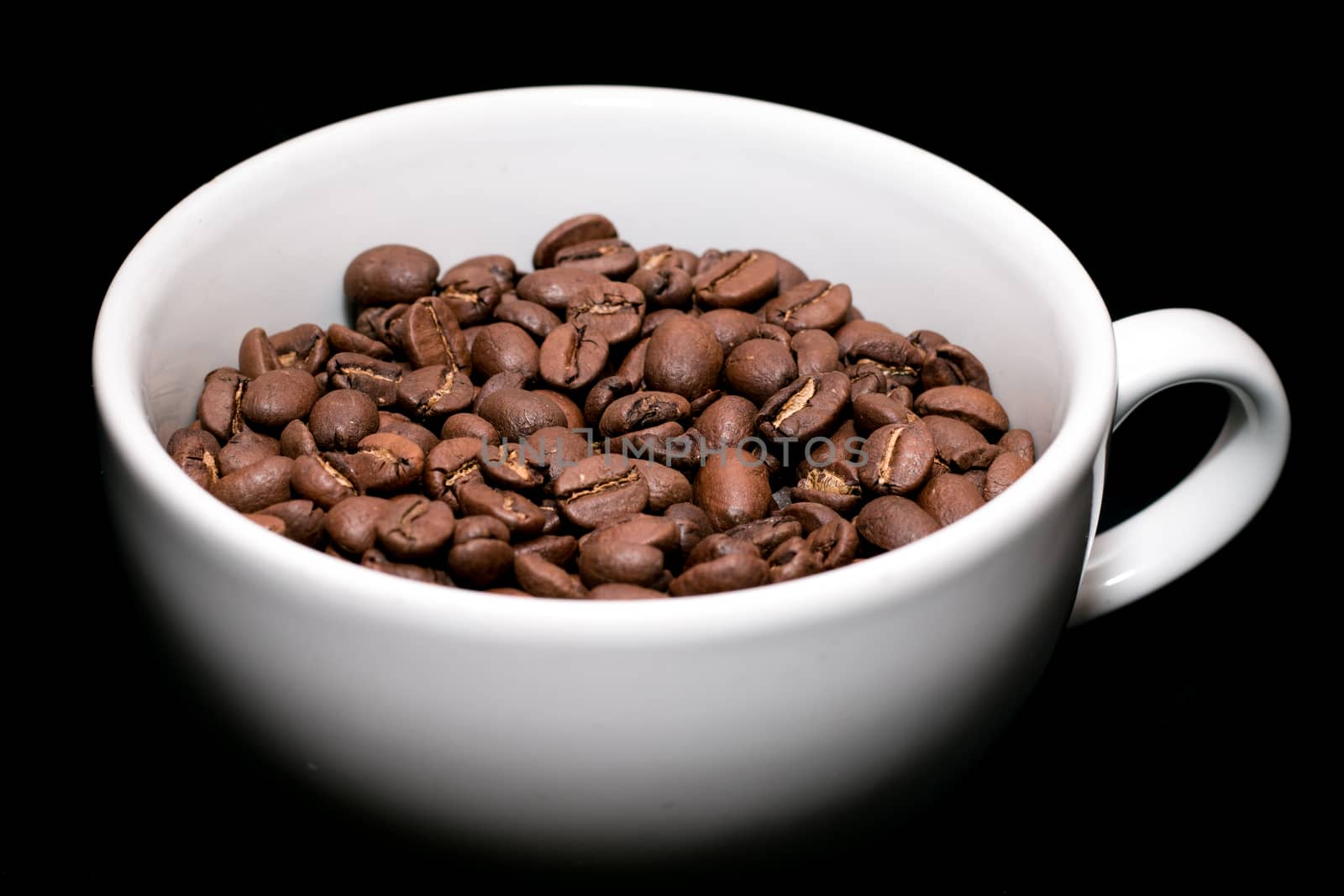 close up Coffee beans in white cup
