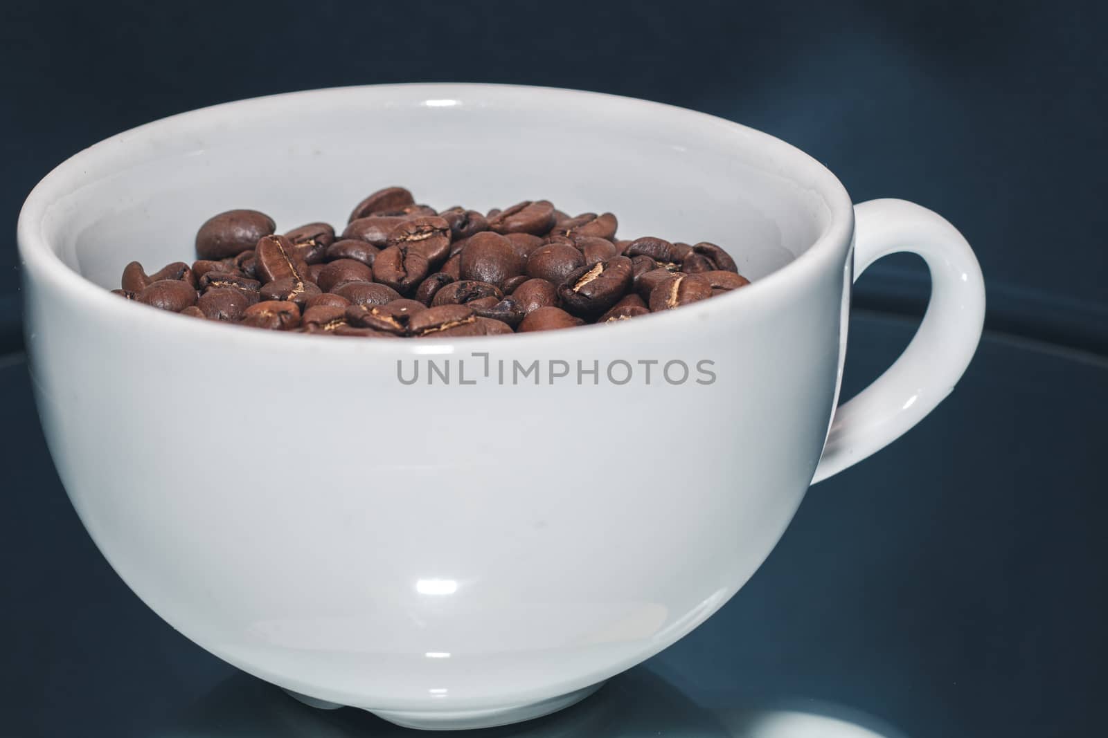 close up Coffee beans in white cup