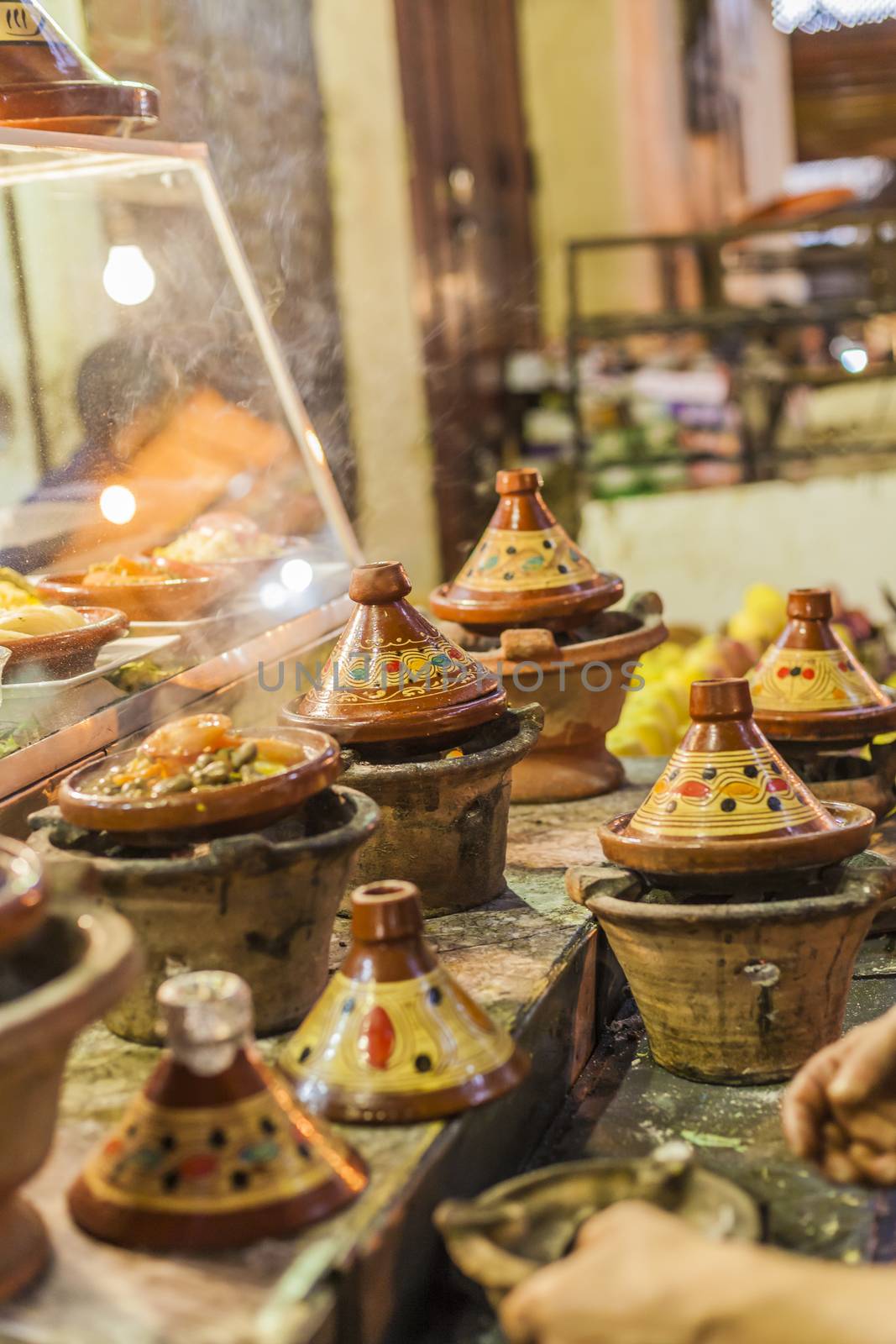 Selection of very colorful Moroccan tajines (traditional cassero by mariusz_prusaczyk