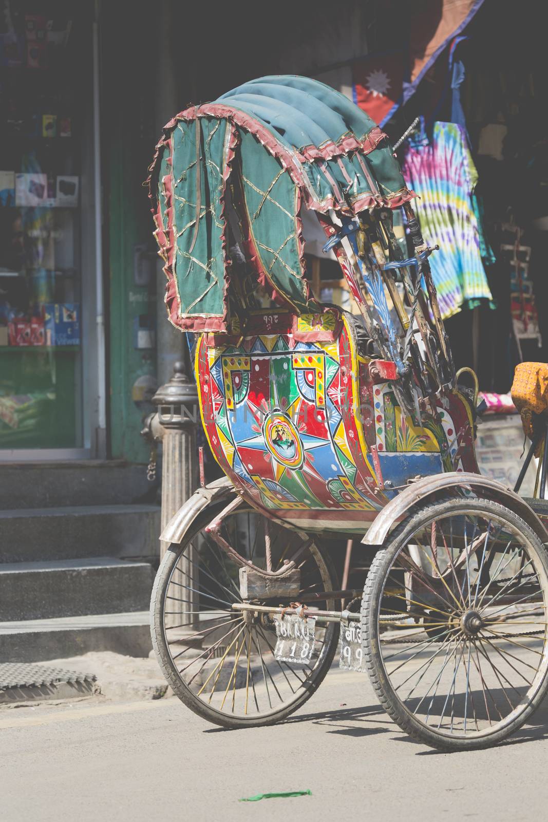 Wheeled rickshaws waiting for customers in Kathmandu by mariusz_prusaczyk