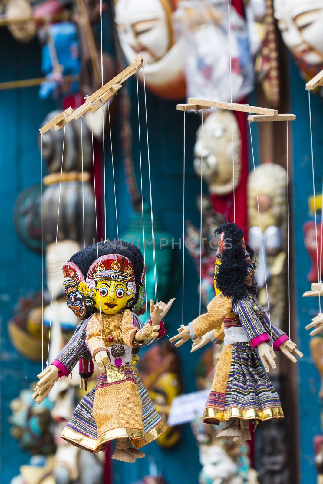Masks, dolls and souvenirs in street shop at Durbar Square in Kathmandu, Nepal.