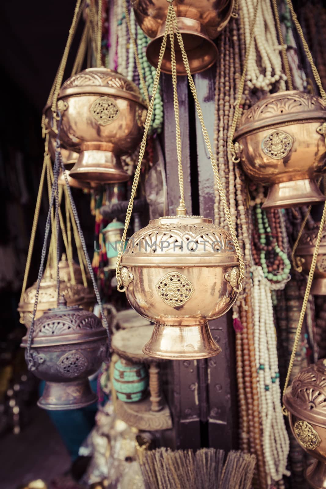 Traditional souvenir in local Nepal market. by mariusz_prusaczyk