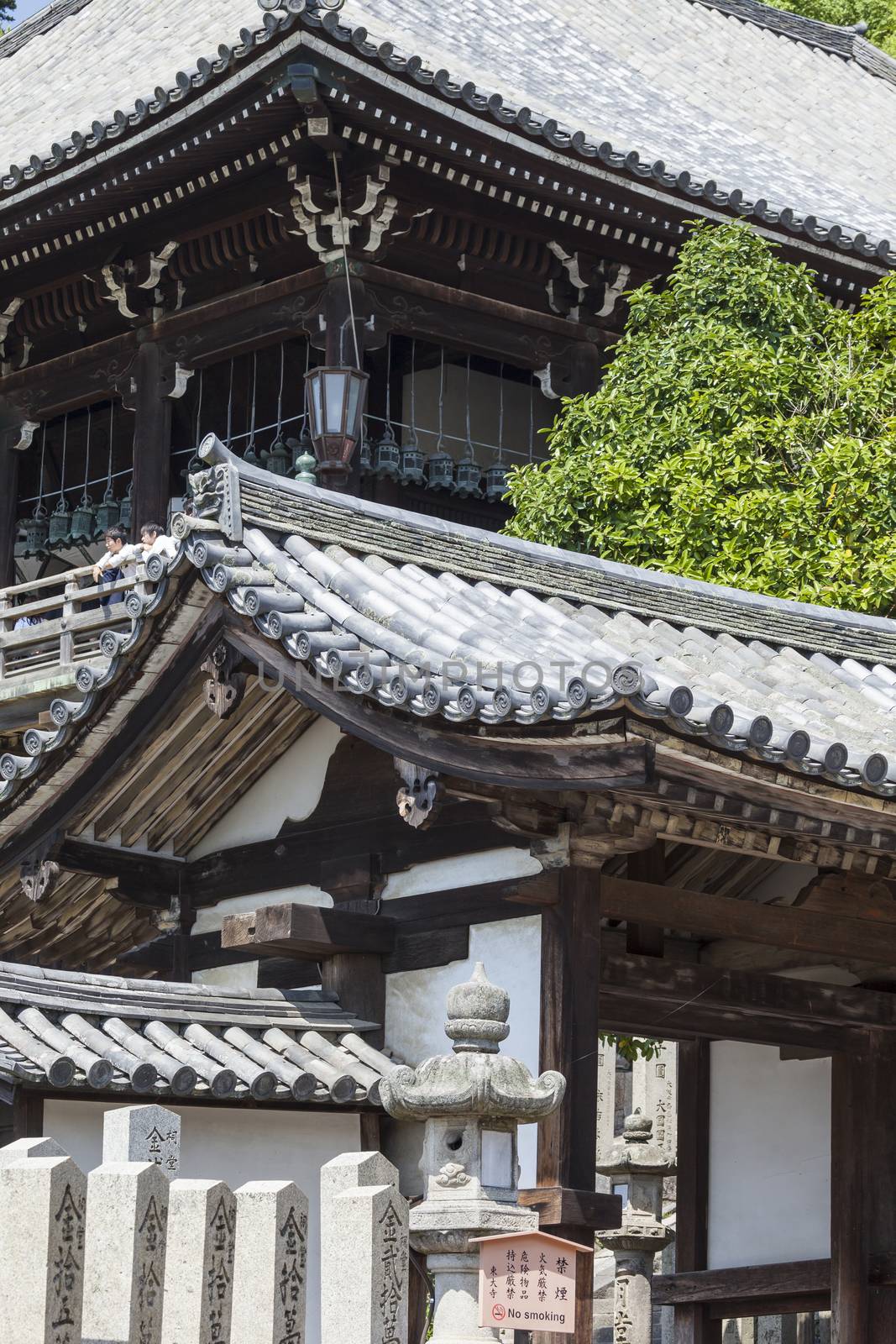 Bottom of steps entering Nigatsu-do Hall on the Todai-ji temple complex on an overcast day in Nara, Japan

