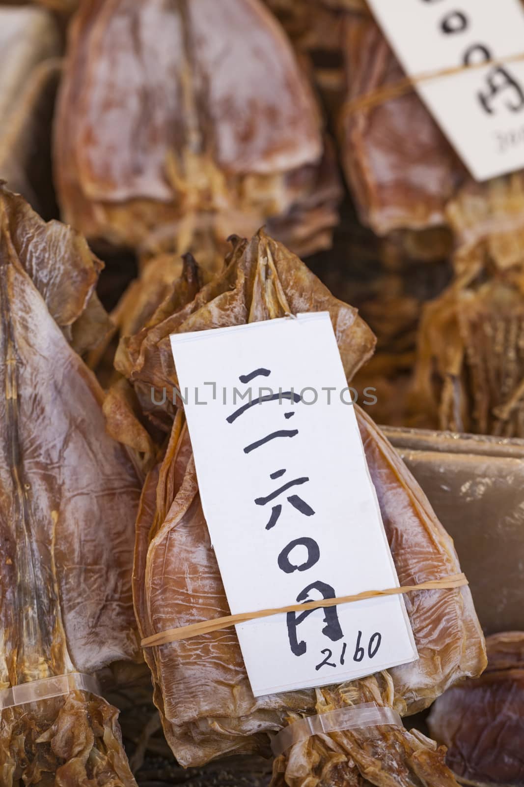 Dried fish, seafood product at market from Japan. by mariusz_prusaczyk