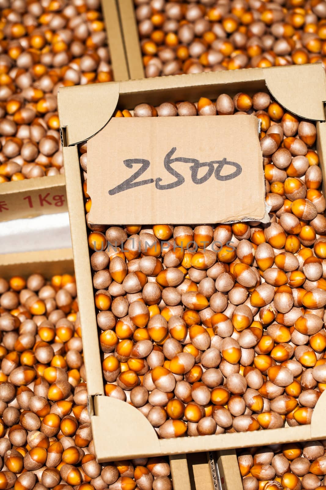 Loose hazelnuts on the market  by mariusz_prusaczyk