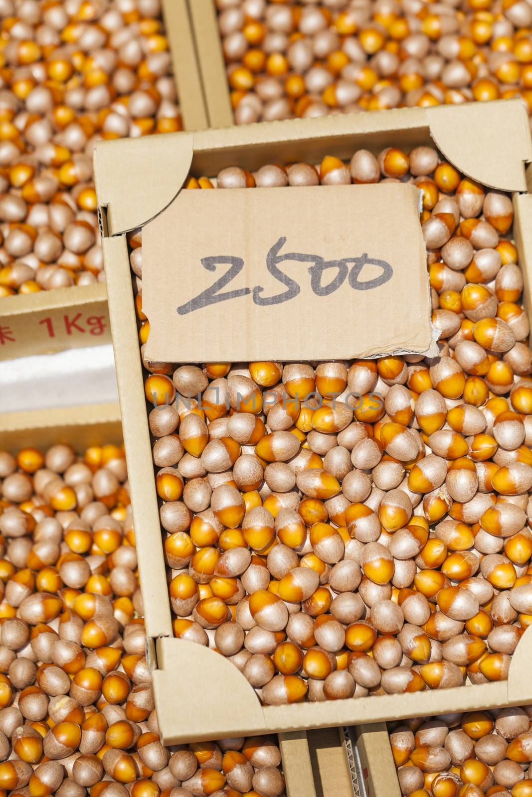 Loose hazelnuts on the market by mariusz_prusaczyk